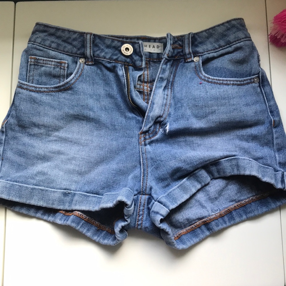 Blue high wasted denim shorts.